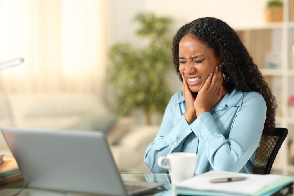 Black self employed suffering tmj at home